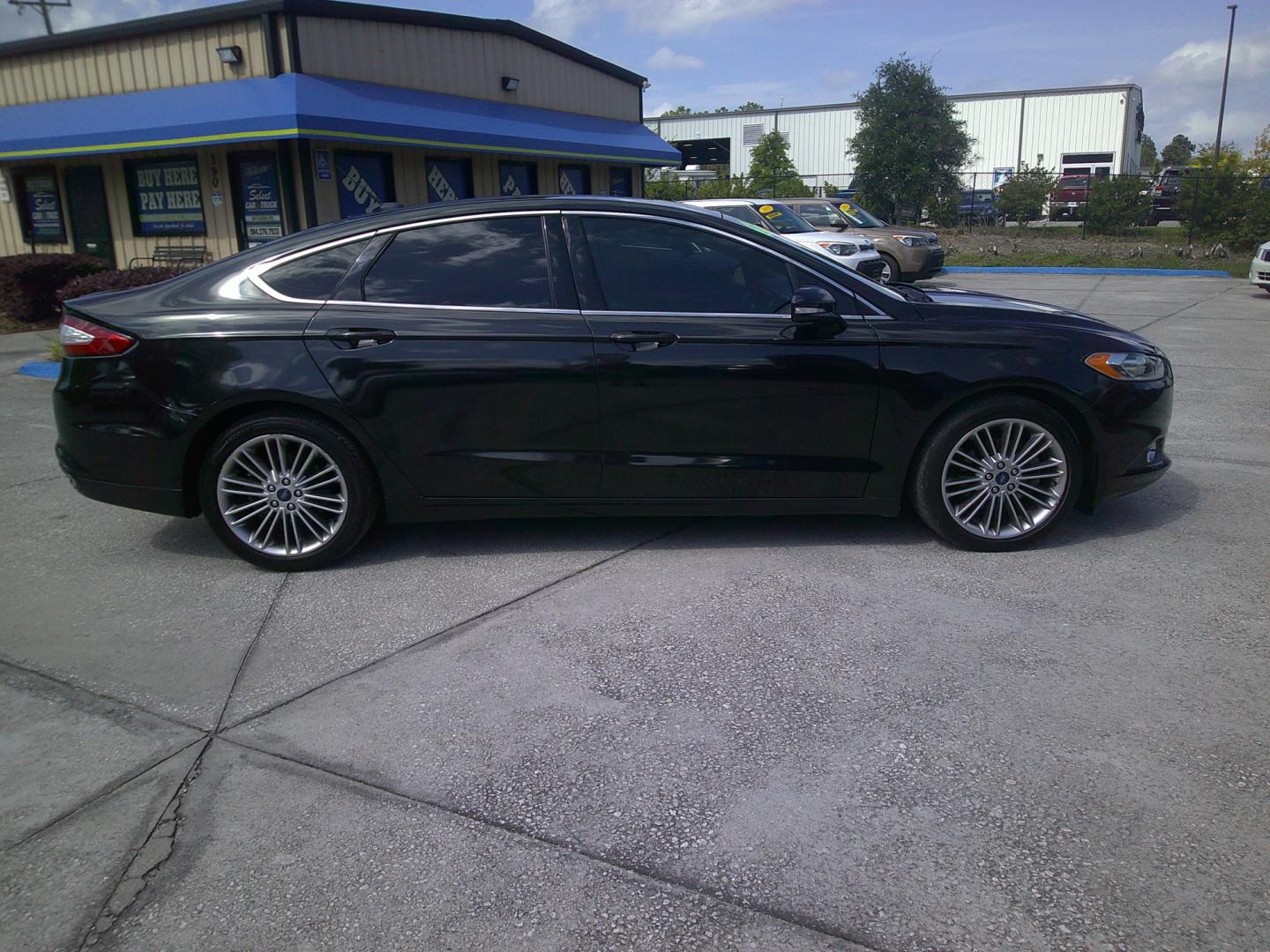 2013 BLACK FORD FUSION (3FA6P0H91DR) , located at 390 Hansen Avenue, Orange Park, FL, 32065, (904) 276-7933, 30.130497, -81.787529 - Photo#2